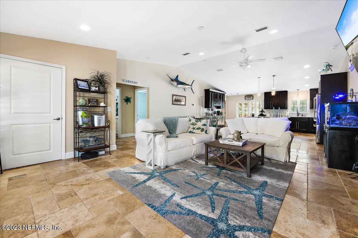 313 Eleventh Street St. Augustine, FL 32084 - Photo 10 of 35 a living room with furniture and a wooden floor