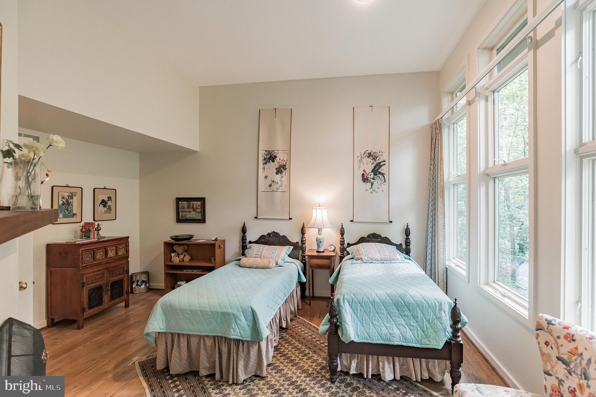 10375 Mackall Road St. Leonard, MD 20685 - Photo 12 of 36 Light-filled guest room with fireplace