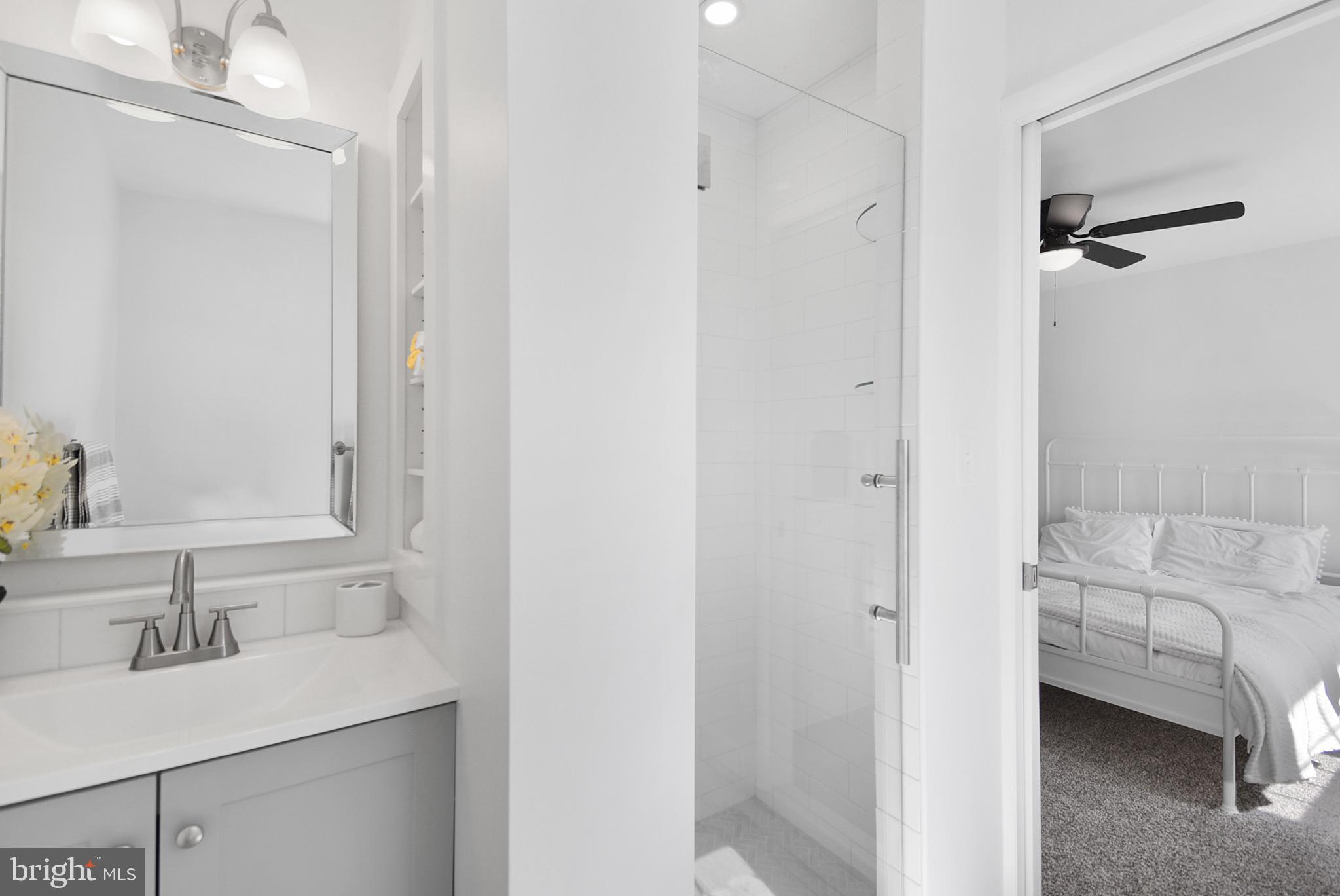 421 Concord Avenue Exton, PA 19341 - Photo 24 of 38 a en suite bathroom with a sink and a mirror