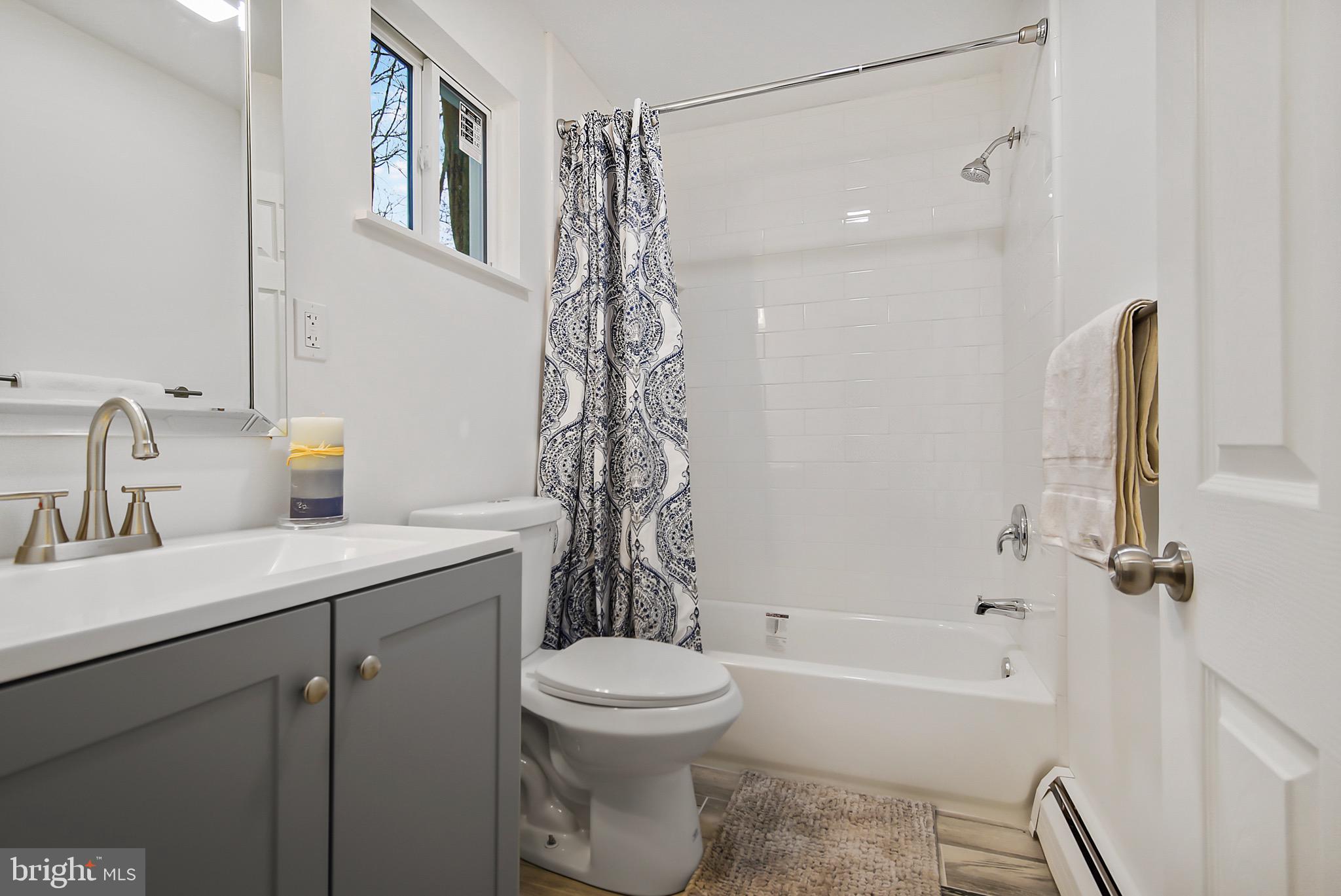 421 Concord Avenue Exton, PA 19341 - Photo 28 of 38 a bathroom with a sink a toilet and shower
