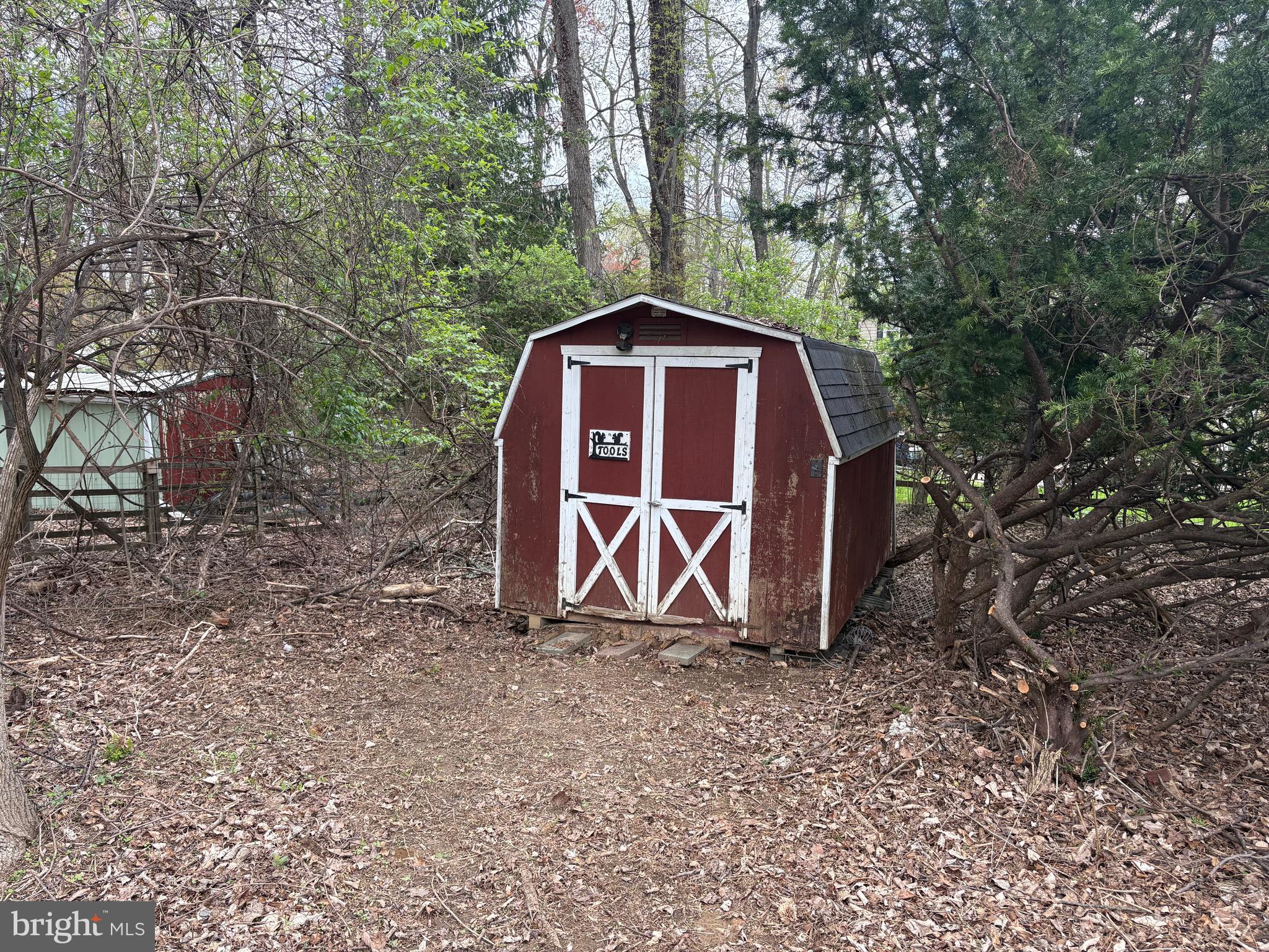 421 Concord Avenue Exton, PA 19341 - Photo 36 of 38 a flag is sitting in the middle of forest