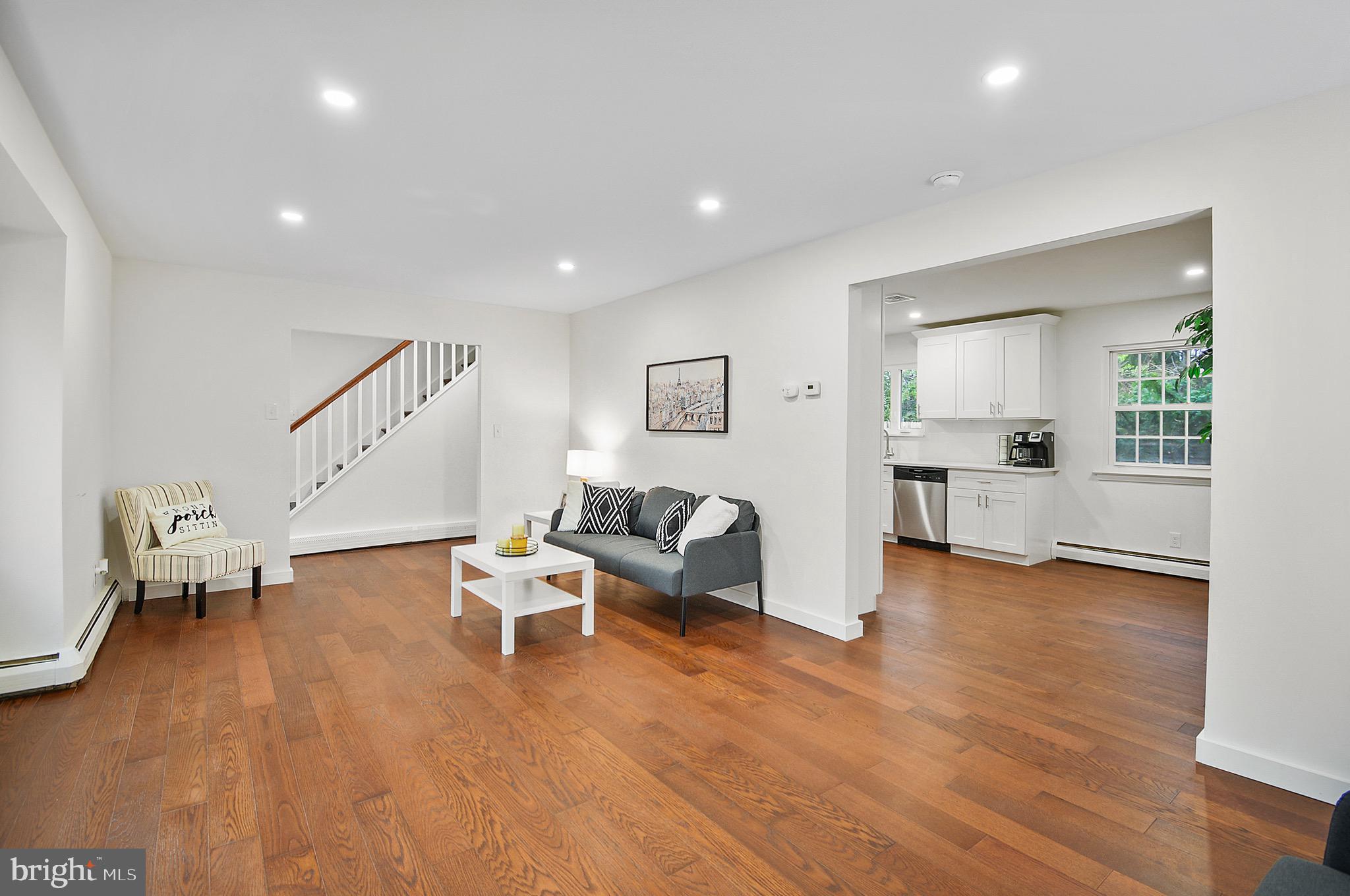 421 Concord Avenue Exton, PA 19341 - Photo 7 of 38 a living room with furniture and a wooden floor