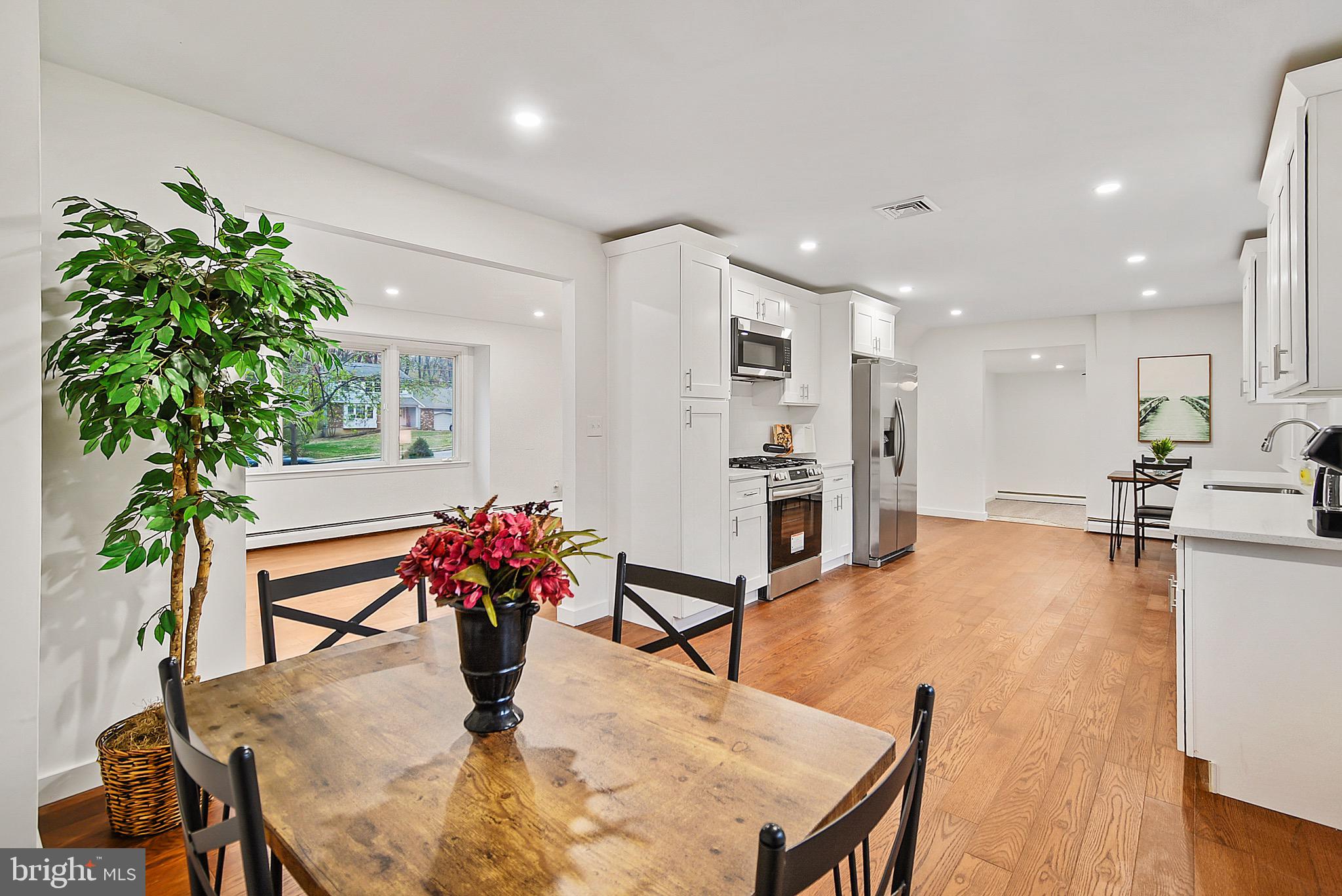 421 Concord Avenue Exton, PA 19341 - Photo 10 of 38 a dining room with furniture and wooden floor