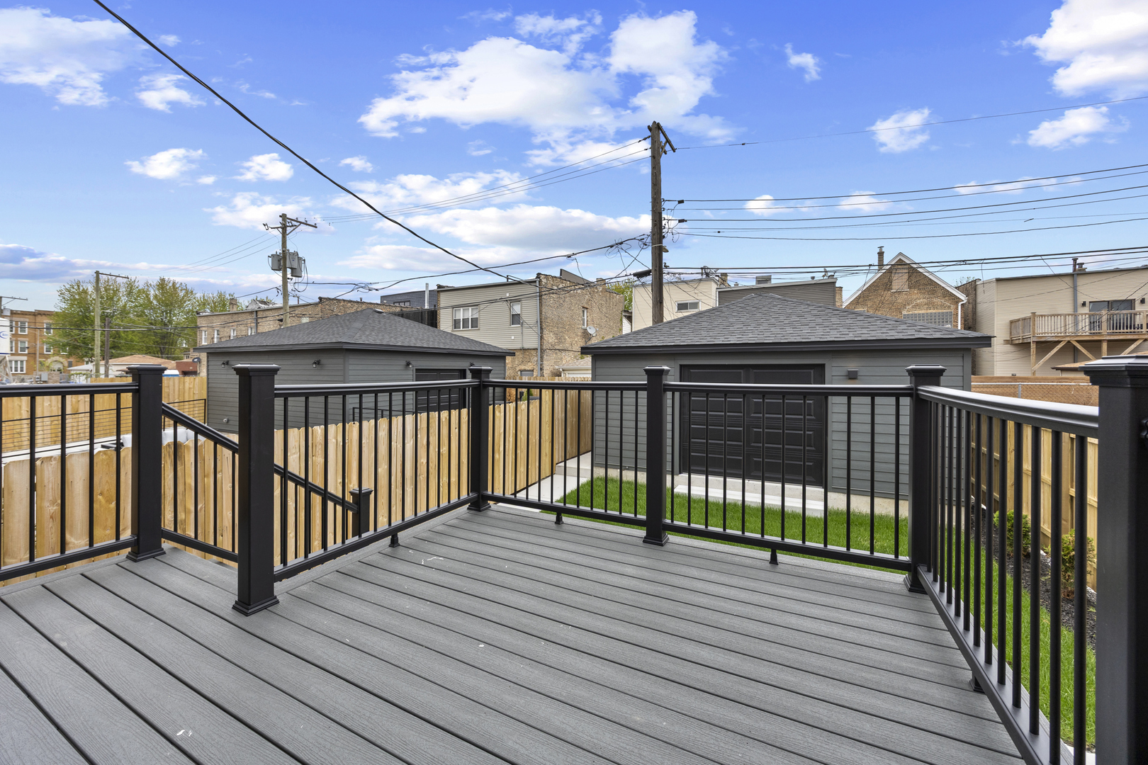 3231 South Shields Avenue Chicago, IL 60616 - Photo 21 of 58 a view of a terrace with wooden floor and fence