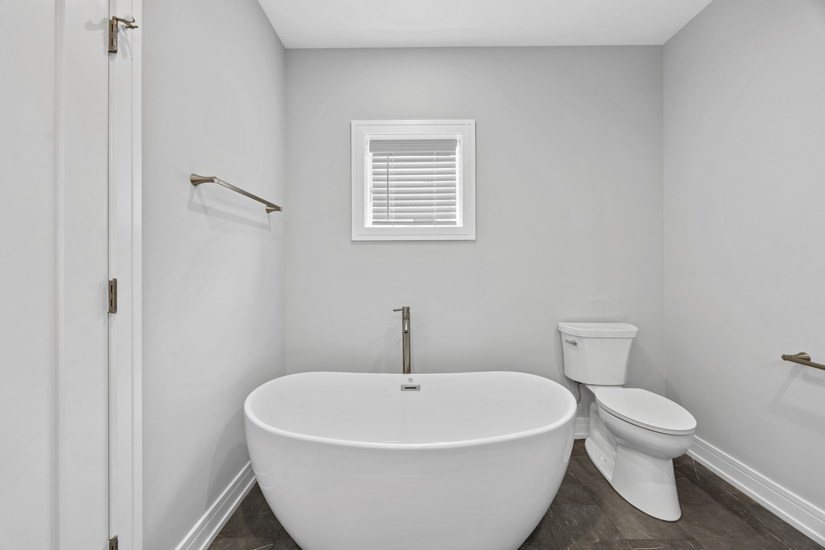 3231 South Shields Avenue Chicago, IL 60616 - Photo 29 of 58 a white toilet sitting next to a white sink