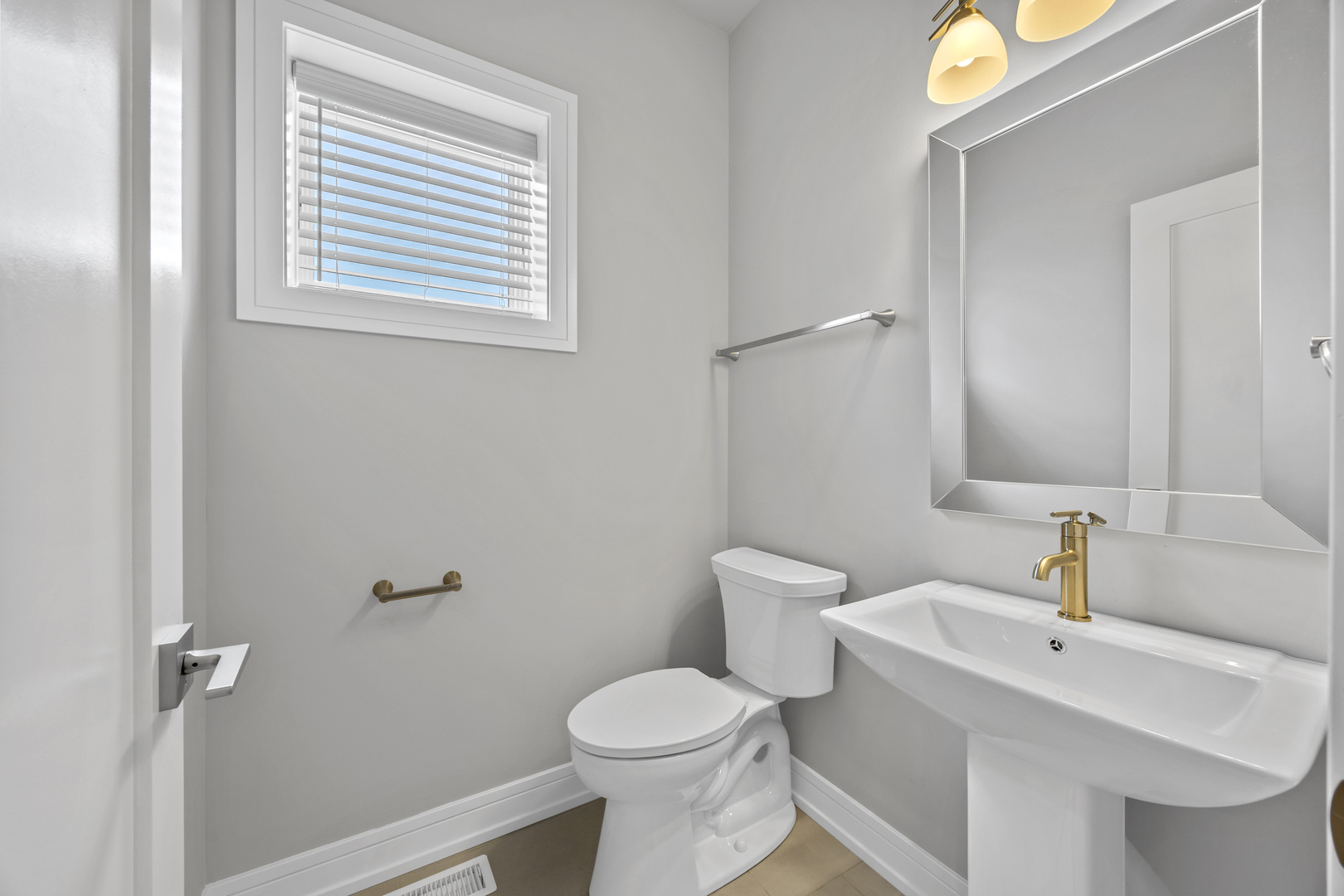 3231 South Shields Avenue Chicago, IL 60616 - Photo 10 of 58 a bathroom with a sink toilet and a mirror