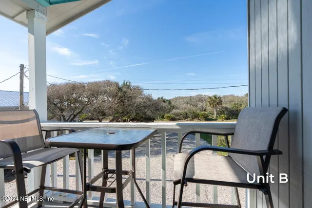 a bathroom with a toilet sink and shower