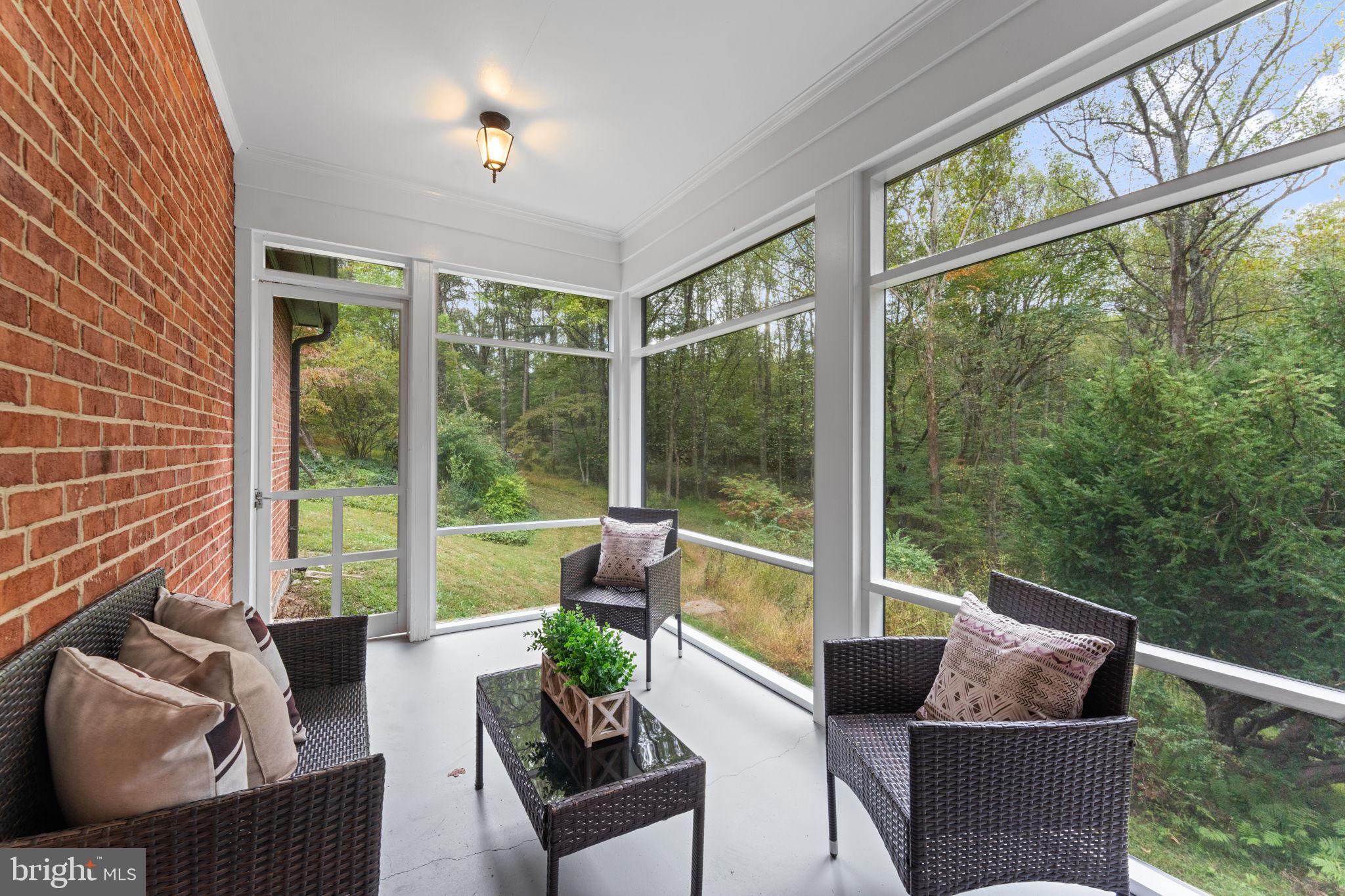 11800 Stoney Creek Road Potomac, MD 20854 - Photo 15 of 78 a living room with furniture and a window