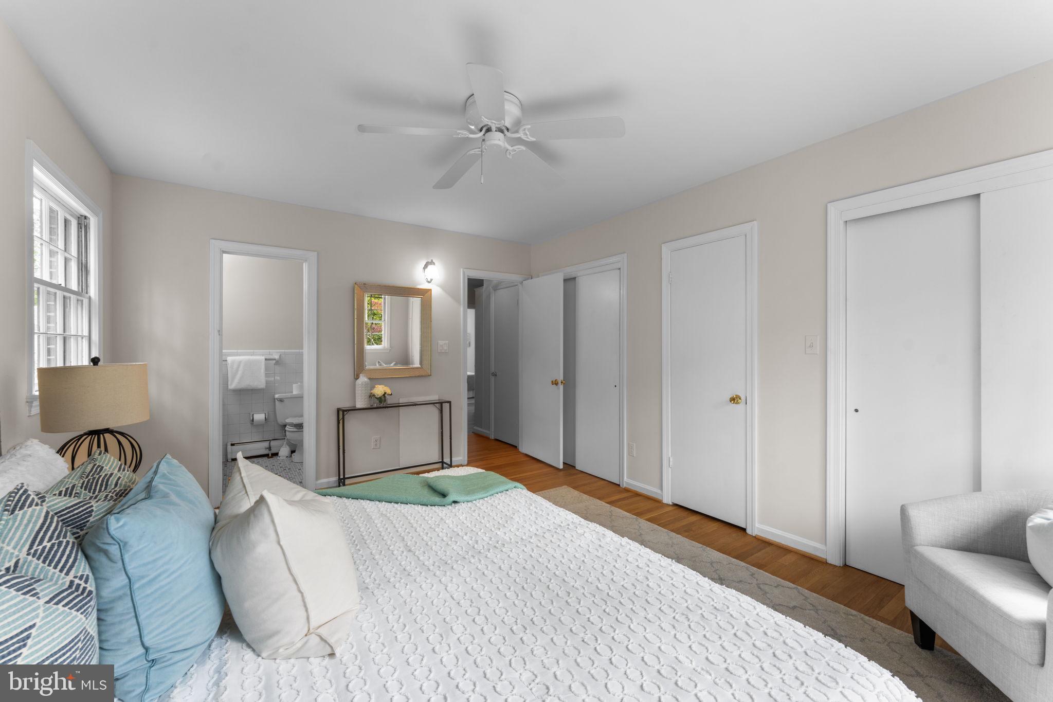 11800 Stoney Creek Road Potomac, MD 20854 - Photo 24 of 78 a bedroom with a bed and ceiling fan