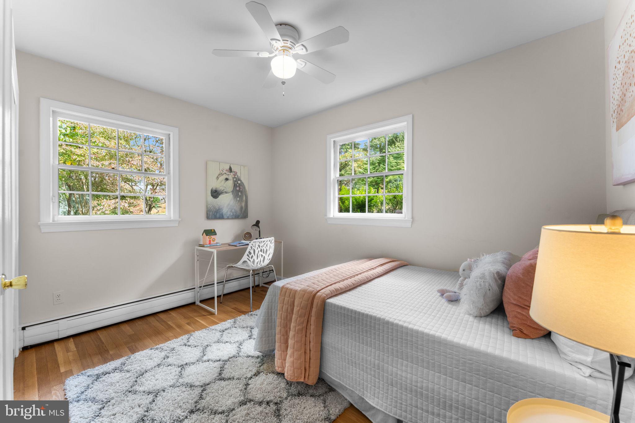 11800 Stoney Creek Road Potomac, MD 20854 - Photo 30 of 78 a bedroom with furniture and a window