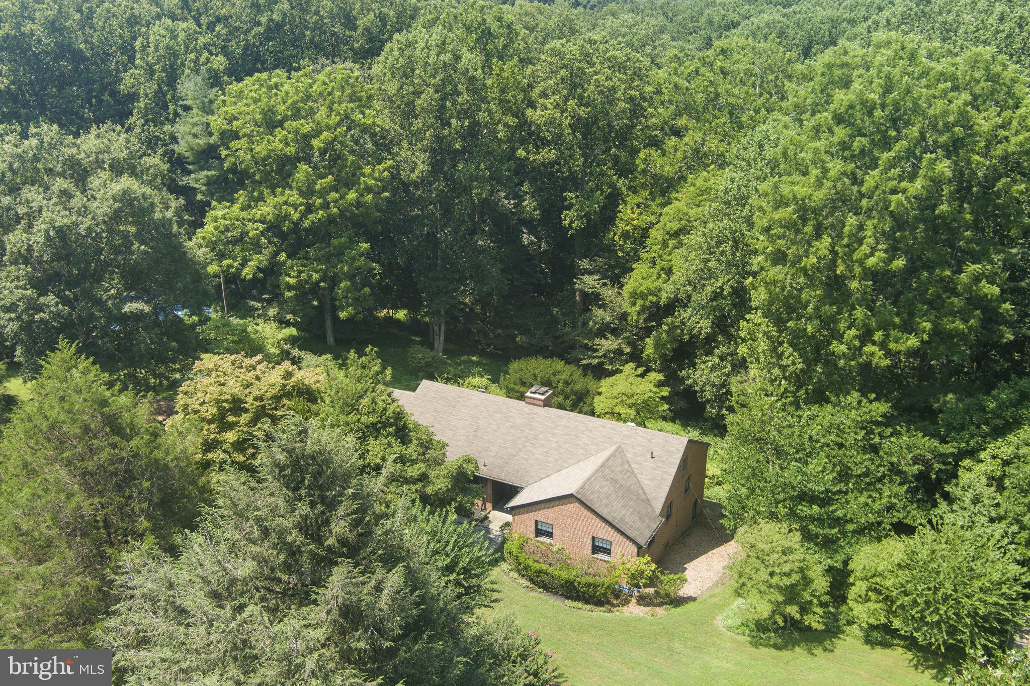 11800 Stoney Creek Road Potomac, MD 20854 - Photo 62 of 78 an aerial view of a house with yard