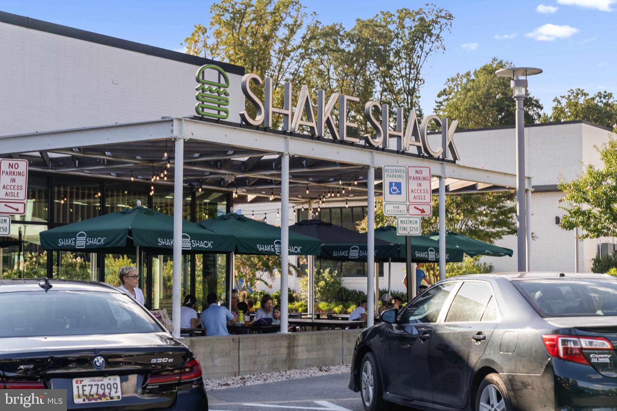 11800 Stoney Creek Road Potomac, MD 20854 - Photo 75 of 78 a view of a car park in front of retail shop