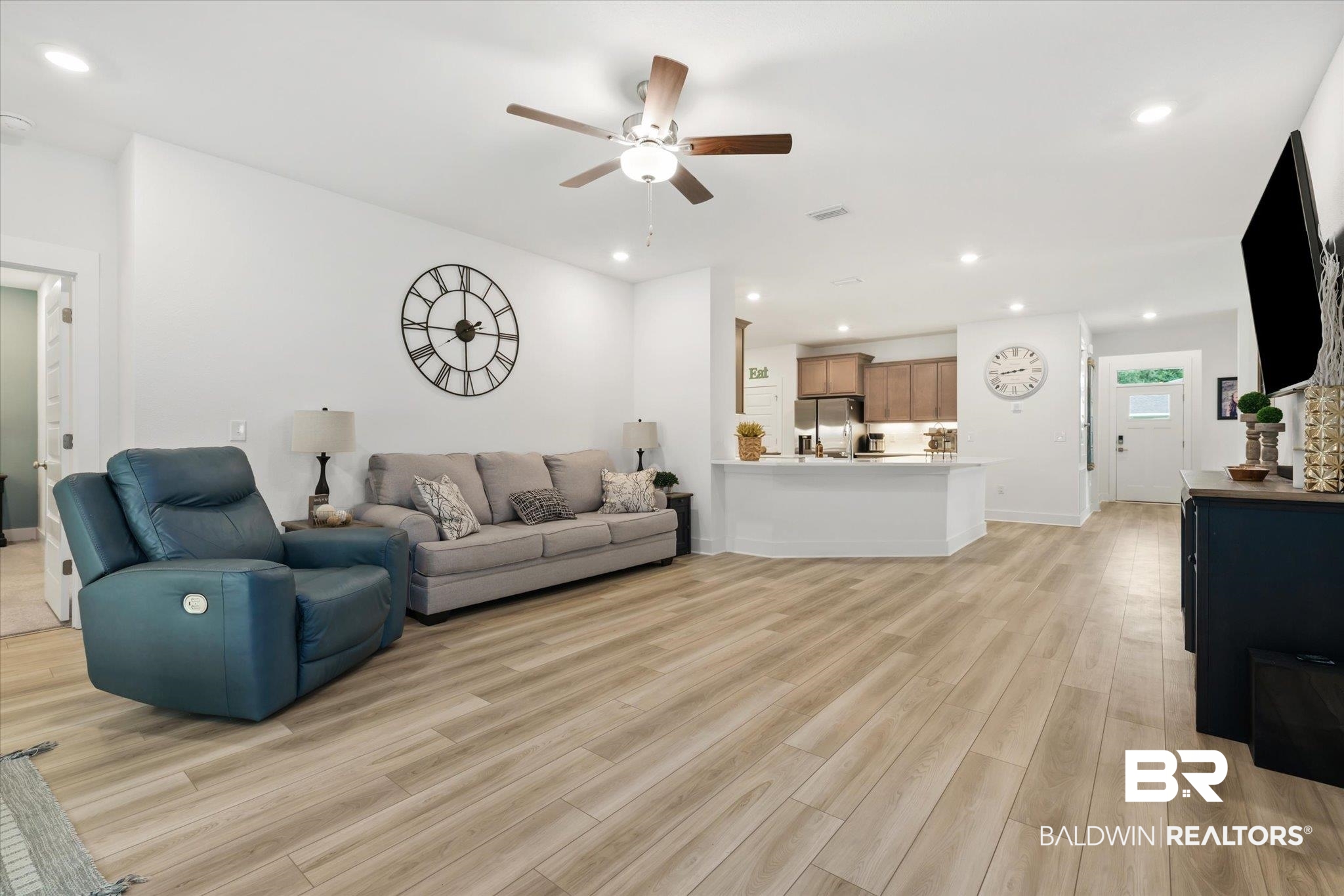263 Bronze Street Fairhope, AL 36532 - Photo 2 of 47 Living room featuring ceiling fan and light hardwood / wood-style floors
