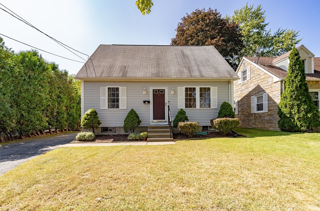 116 Garland Street Springfield, MA 01118 - Photo 1 of 31 a view of a house with yard and sitting area