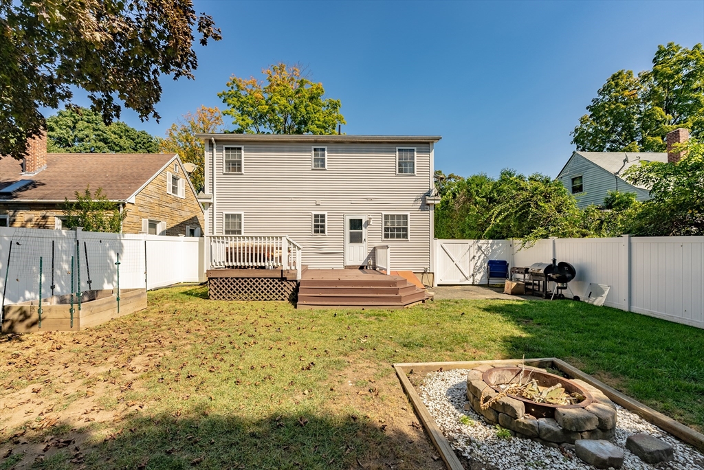 116 Garland Street Springfield, MA 01118 - Photo 30 of 31 a view of a house with backyard and sitting area