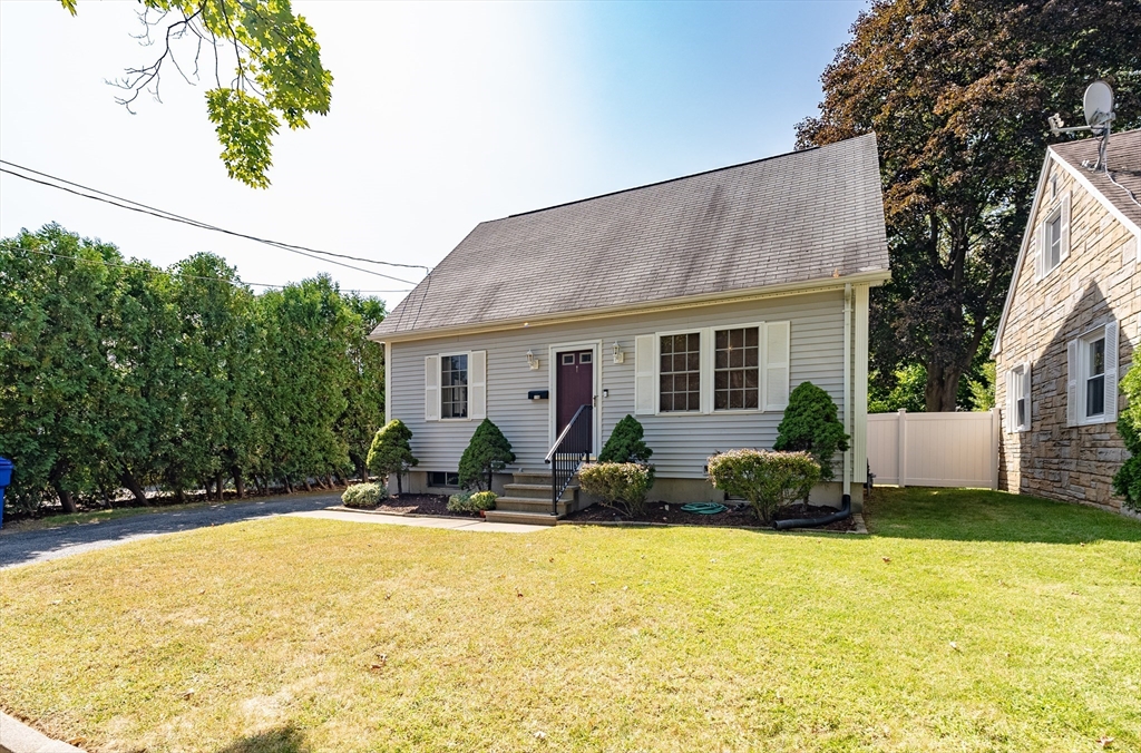 116 Garland Street Springfield, MA 01118 - Photo 3 of 31 a view of a house with swimming pool and sitting area