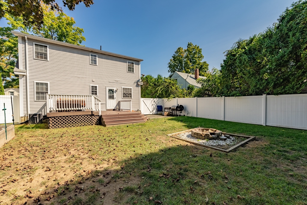 116 Garland Street Springfield, MA 01118 - Photo 31 of 31 a backyard of a house with table and chairs