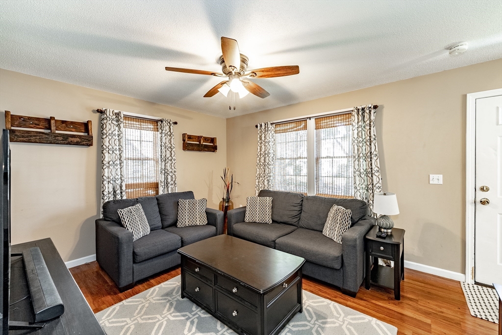 116 Garland Street Springfield, MA 01118 - Photo 5 of 31 a living room with furniture and a window
