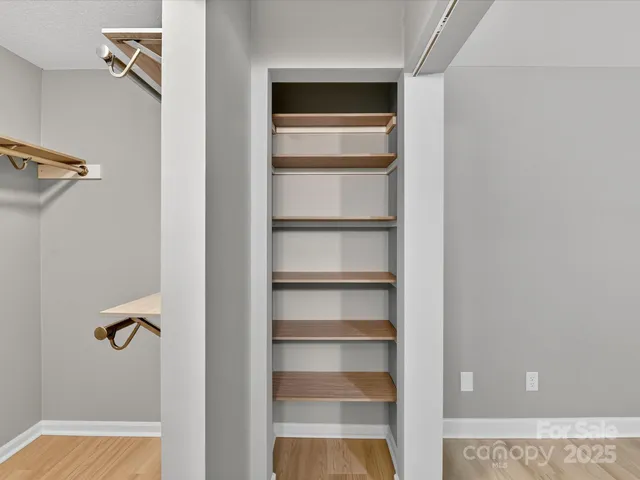 a view of a room with rack on the wall