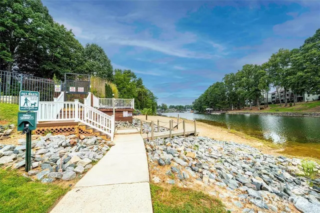 a view of a swimming pool with a patio