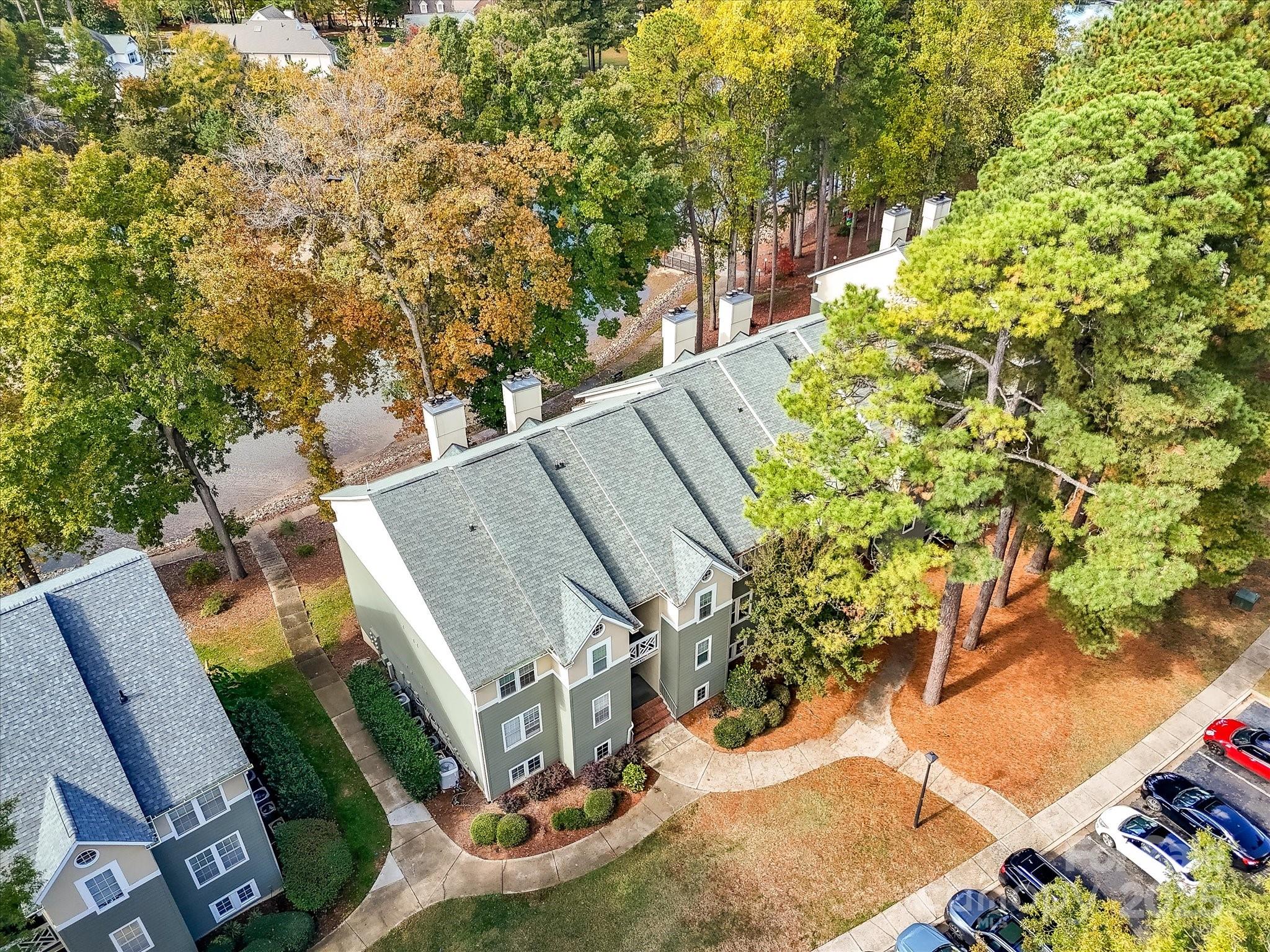 20115 Henderson Road, Unit D Cornelius, NC 28031 - Photo 37 of 44 an aerial view of a house with a yard