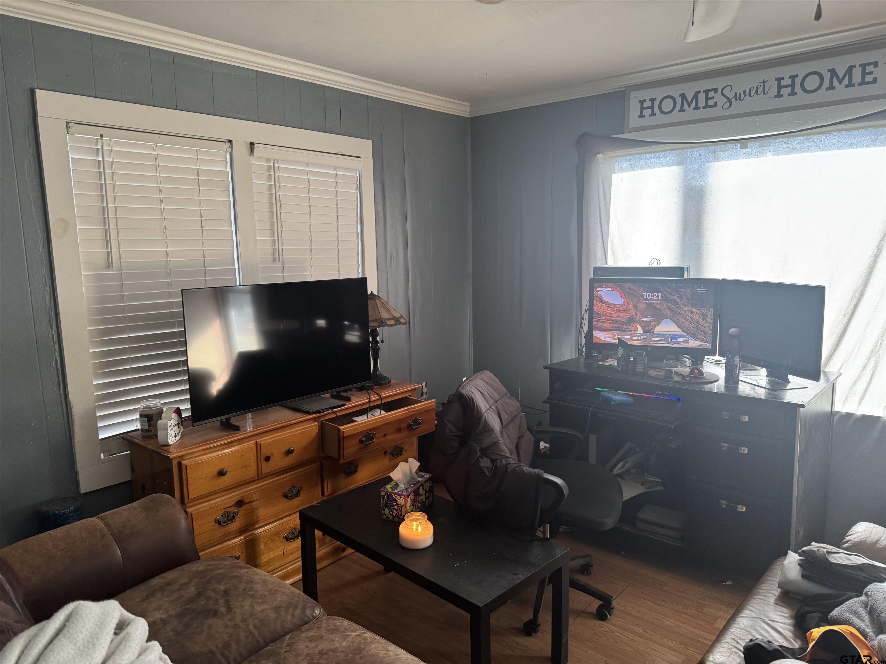 103 Mallory Street Lindale, TX 75771 - Photo 7 of 10 a workspace with furniture and window