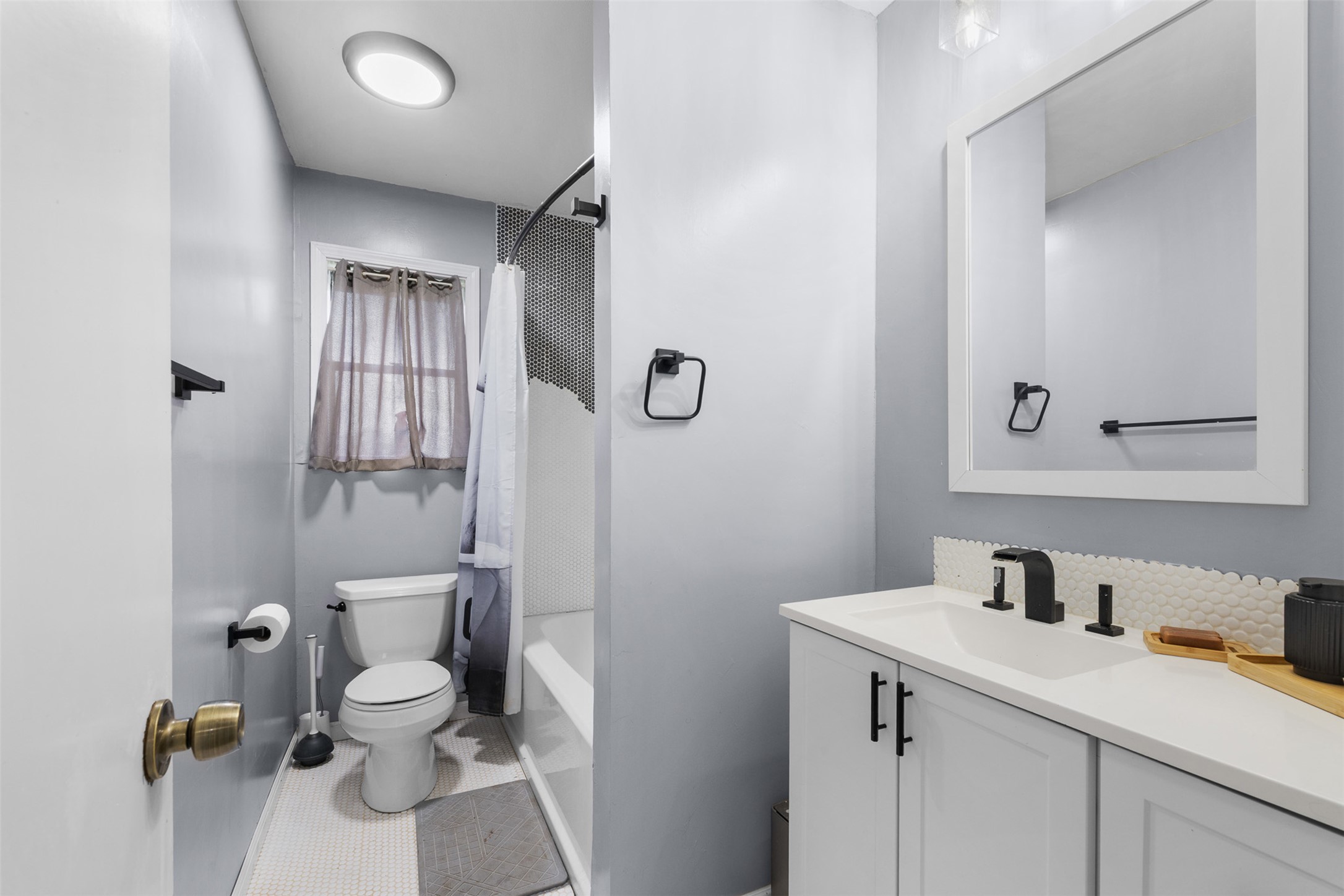 1015 FM 112 Road Lexington, TX 78947 - Photo 16 of 38 a bathroom with a sink toilet and shower