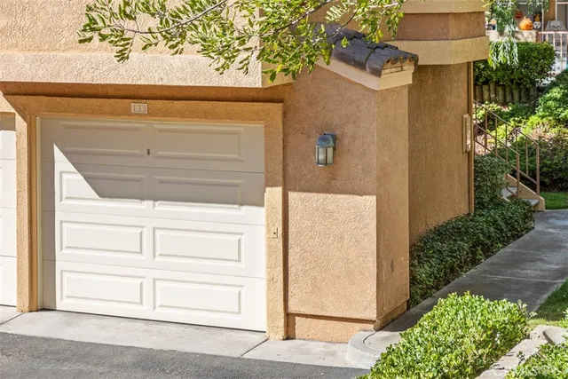 a view of a house with a door and a garage