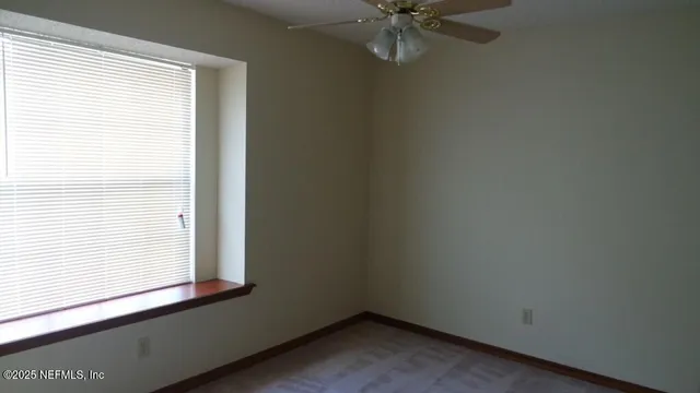 an empty room with a window