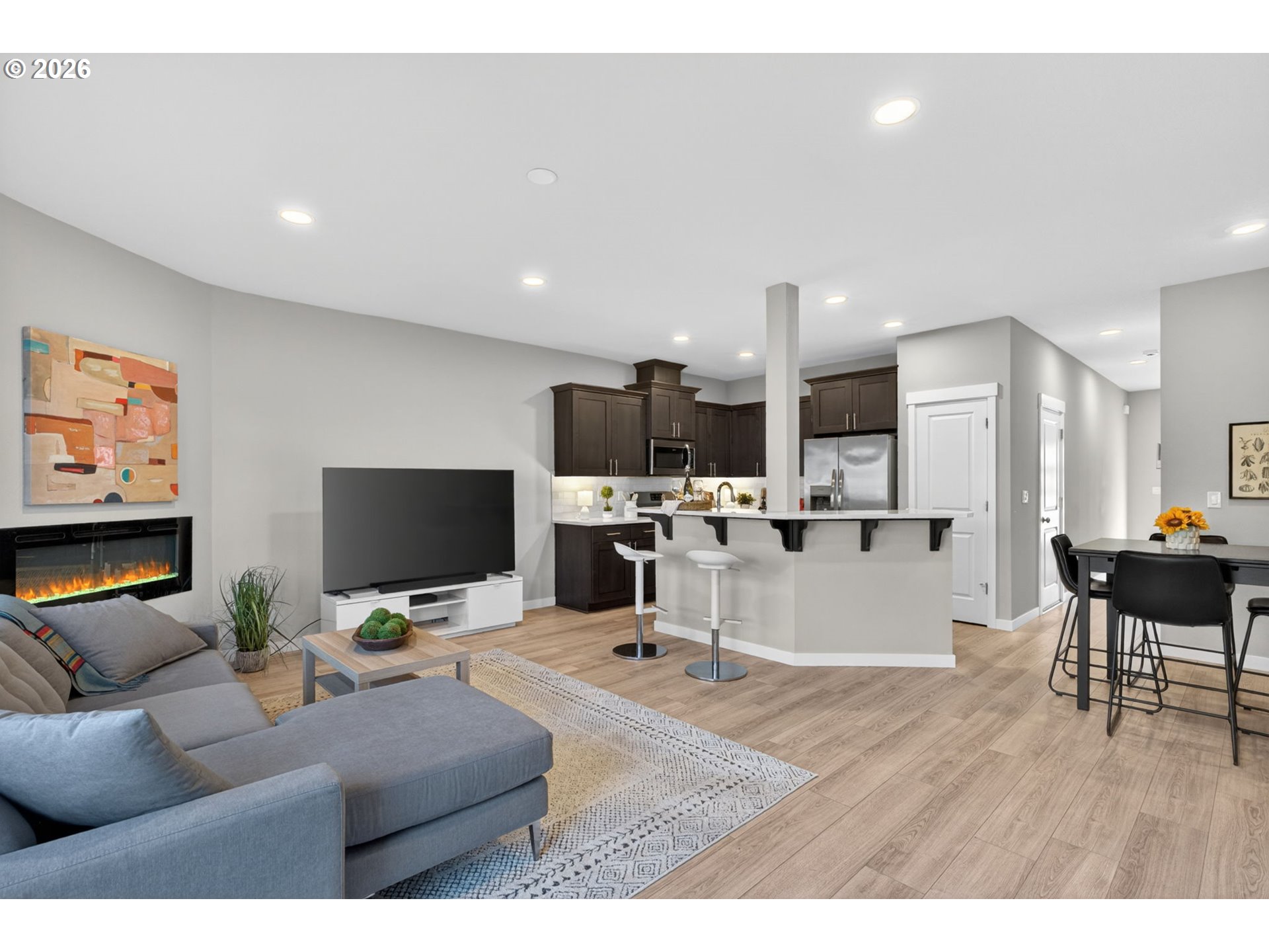 2876 South Nectarine Street Cornelius, OR 97113 - Photo 15 of 42 a living room with furniture and a flat screen tv