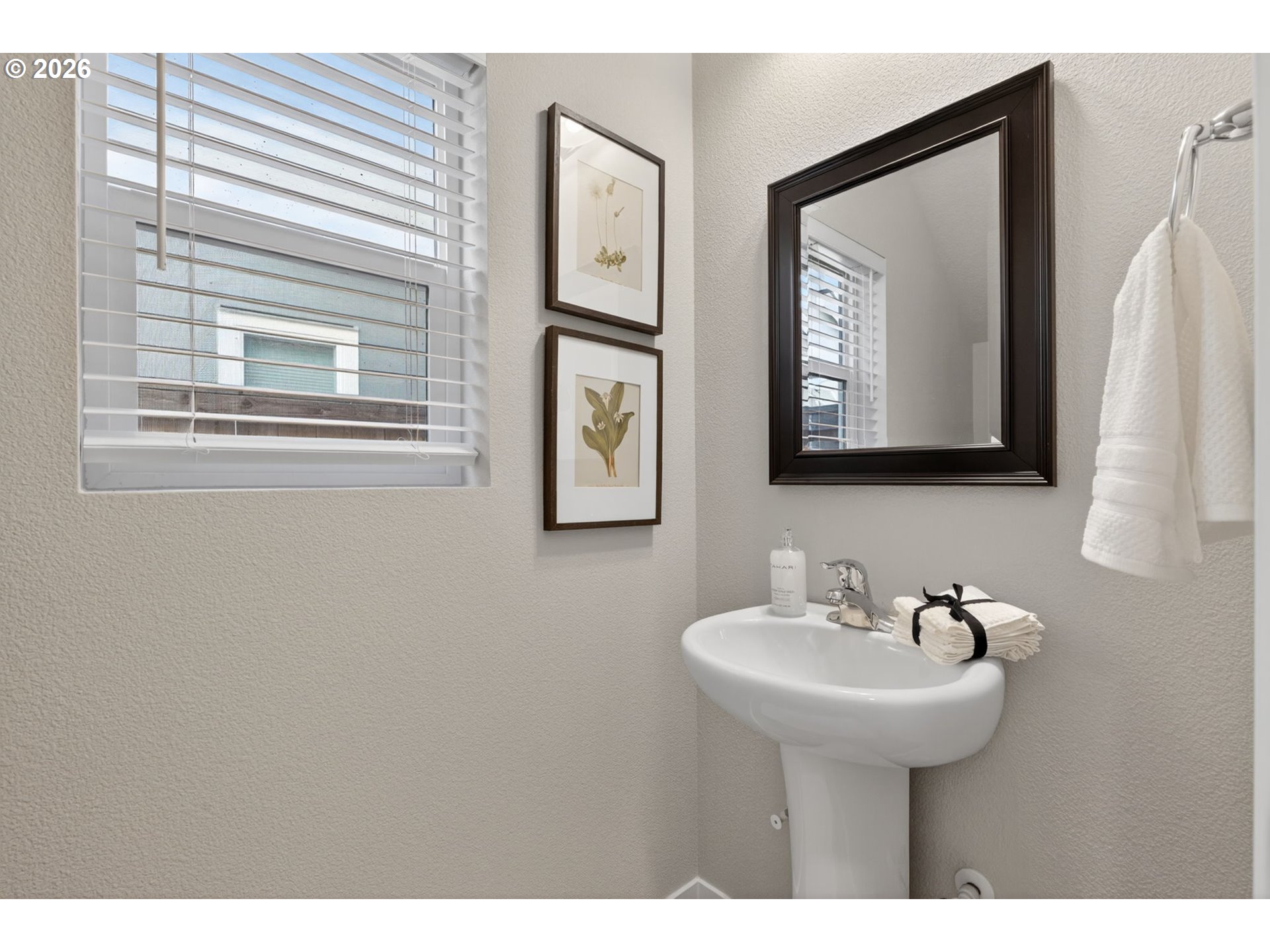 2876 South Nectarine Street Cornelius, OR 97113 - Photo 17 of 42 a bathroom with a sink and a mirror