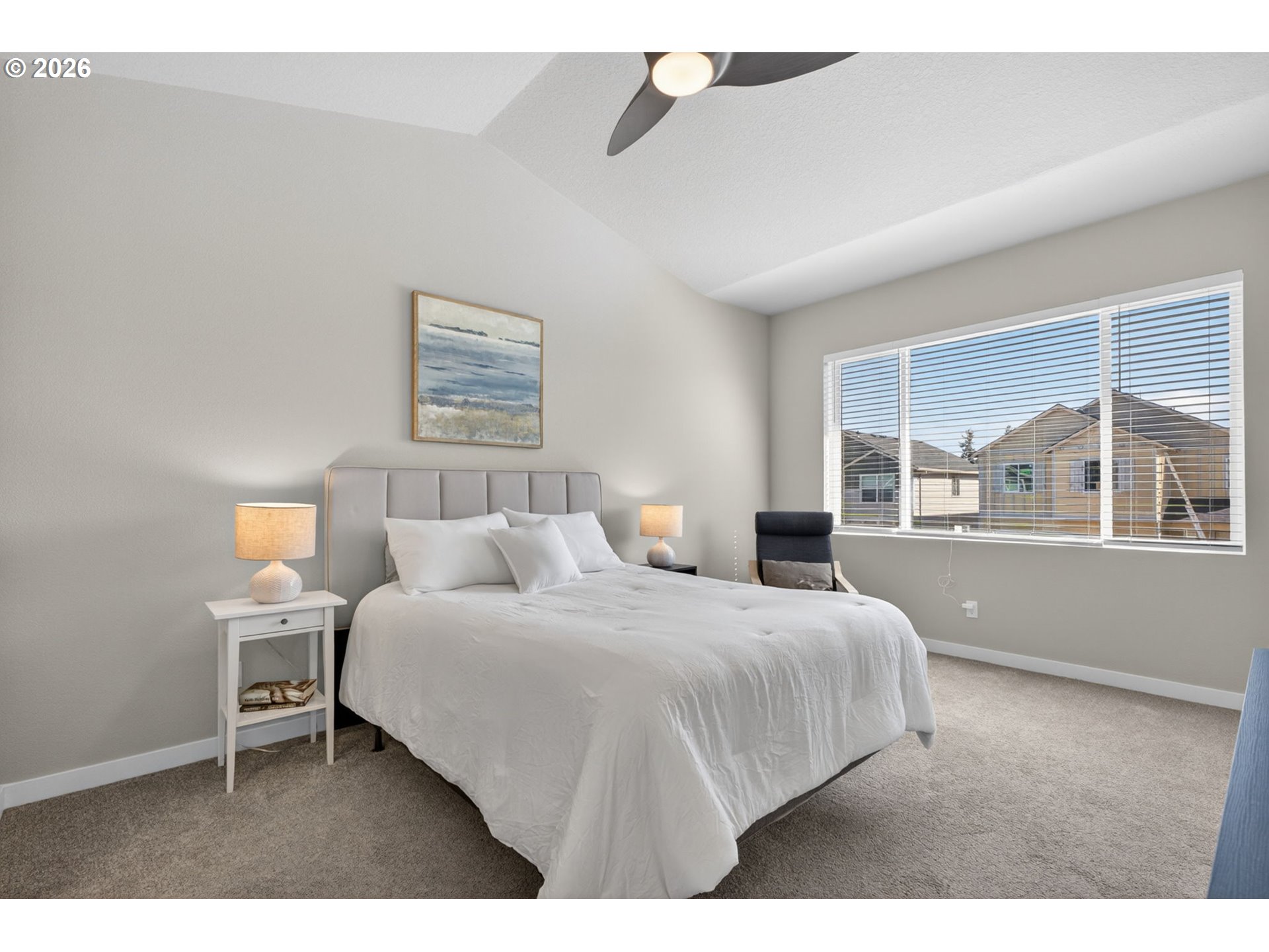 2876 South Nectarine Street Cornelius, OR 97113 - Photo 19 of 42 a bedroom with a large bed and a window