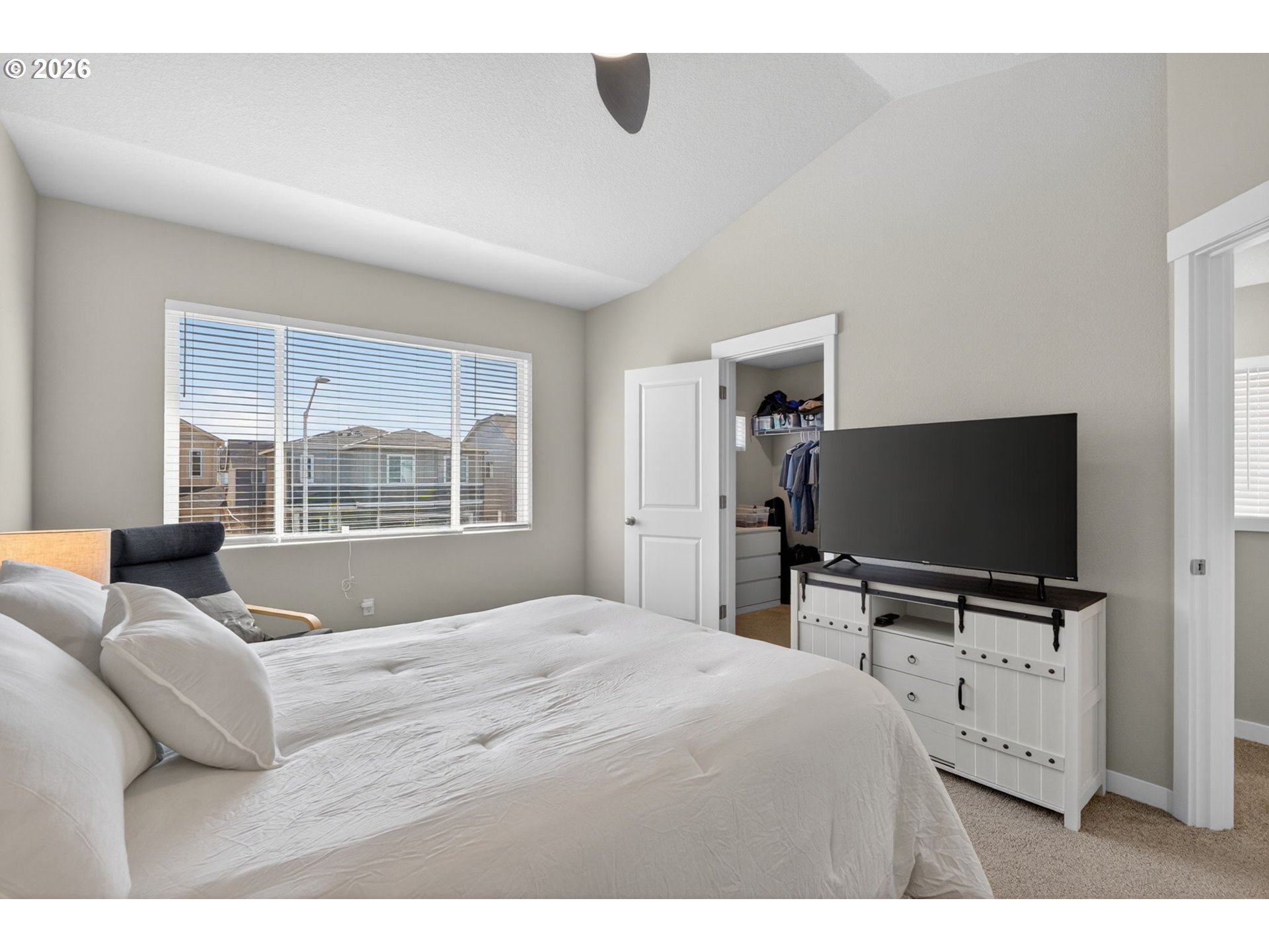 2876 South Nectarine Street Cornelius, OR 97113 - Photo 20 of 42 a bedroom with a bed and a flat screen tv