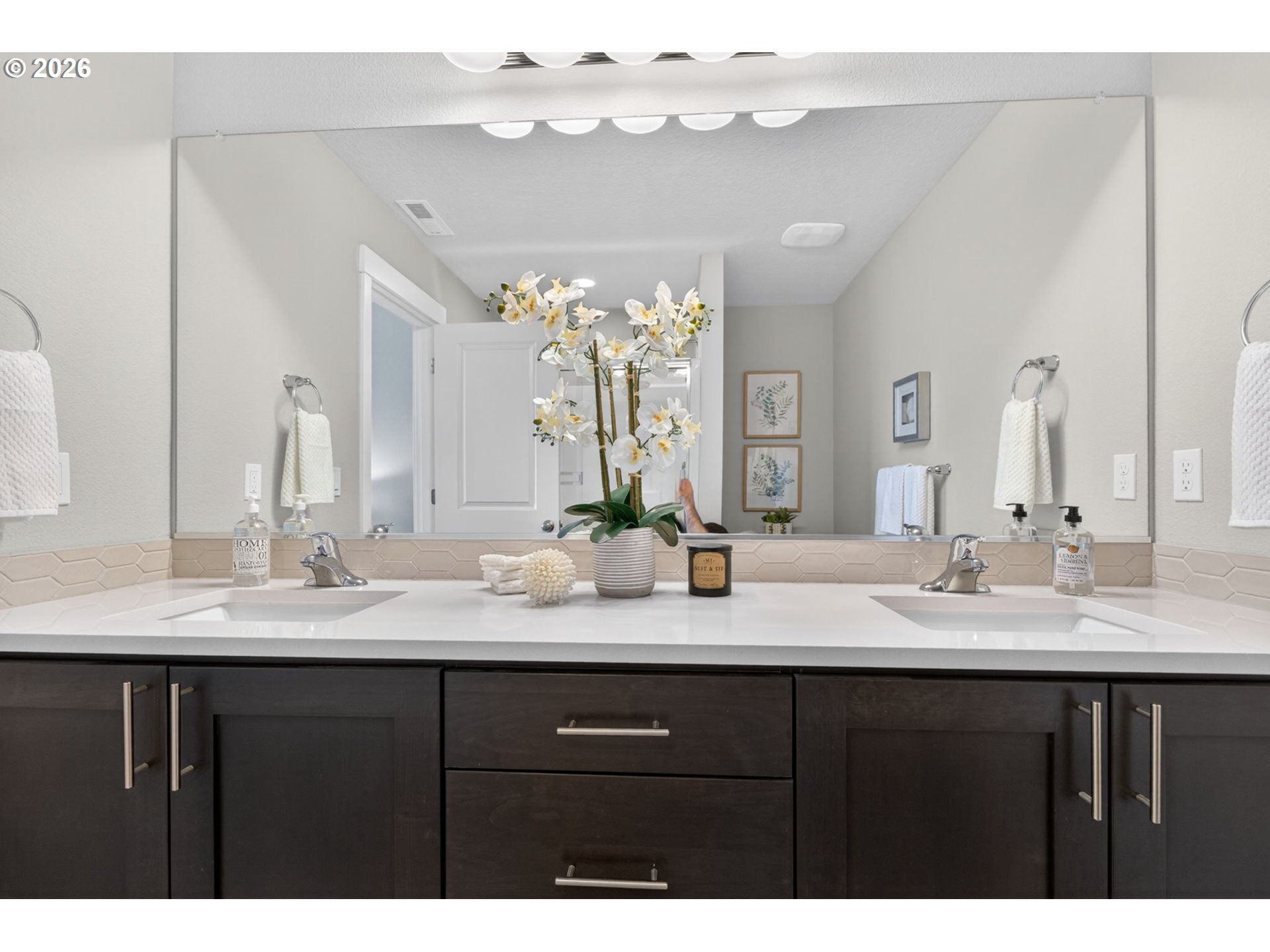 2876 South Nectarine Street Cornelius, OR 97113 - Photo 23 of 42 a bathroom with a granite countertop sink a large mirror and vanity
