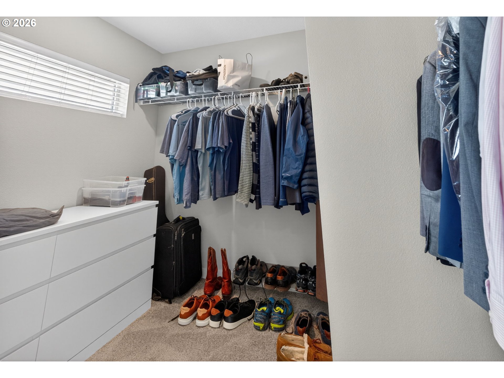 2876 South Nectarine Street Cornelius, OR 97113 - Photo 25 of 42 a view of walk in closet with clothes shoes and a mirror