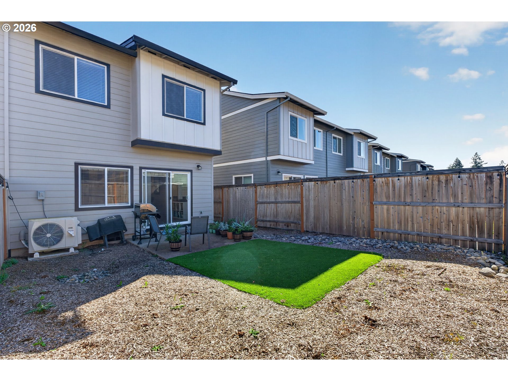 2876 South Nectarine Street Cornelius, OR 97113 - Photo 35 of 42 a front view of a house with garden