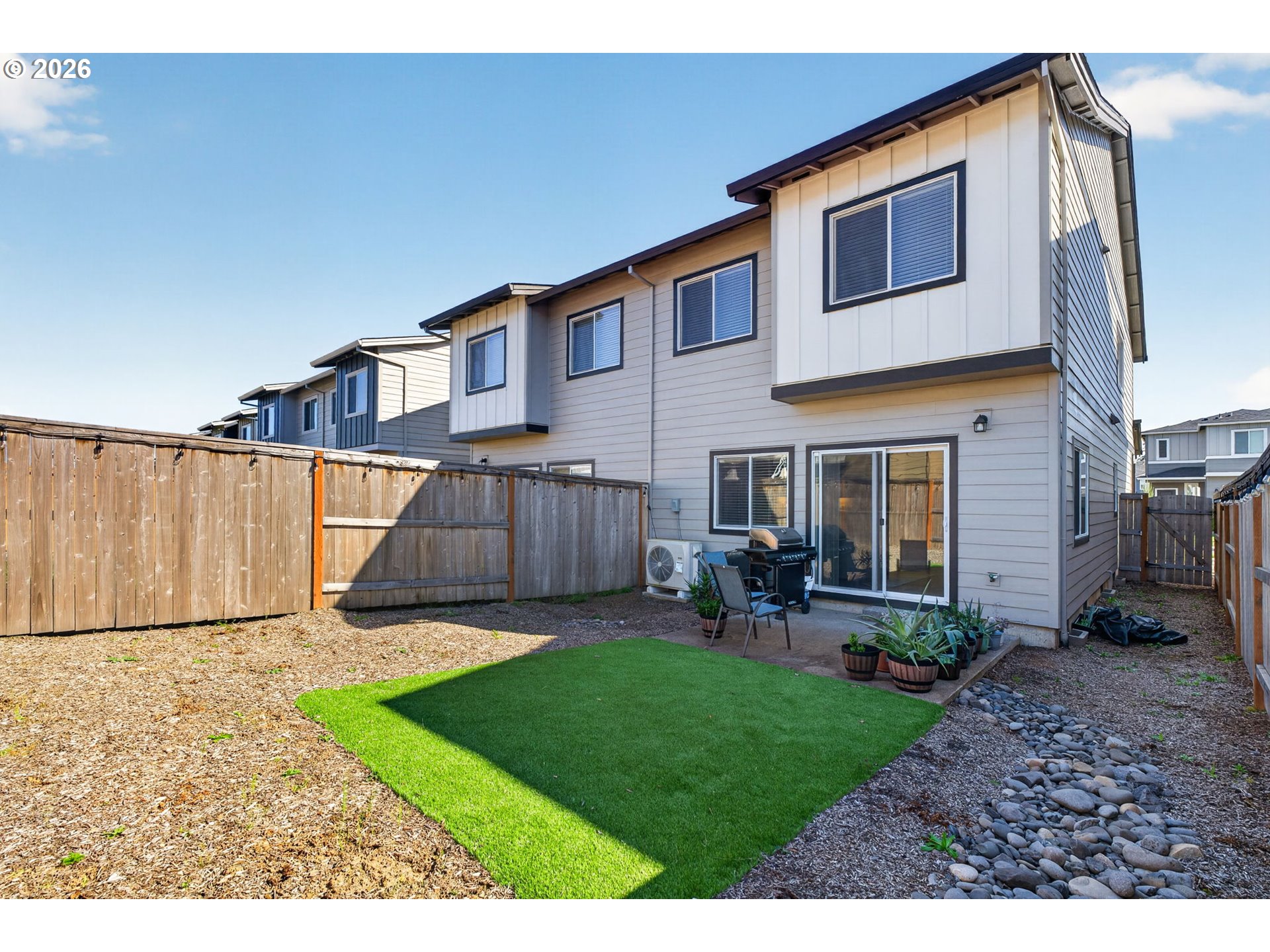 2876 South Nectarine Street Cornelius, OR 97113 - Photo 36 of 42 a view of a house with a yard and sitting area