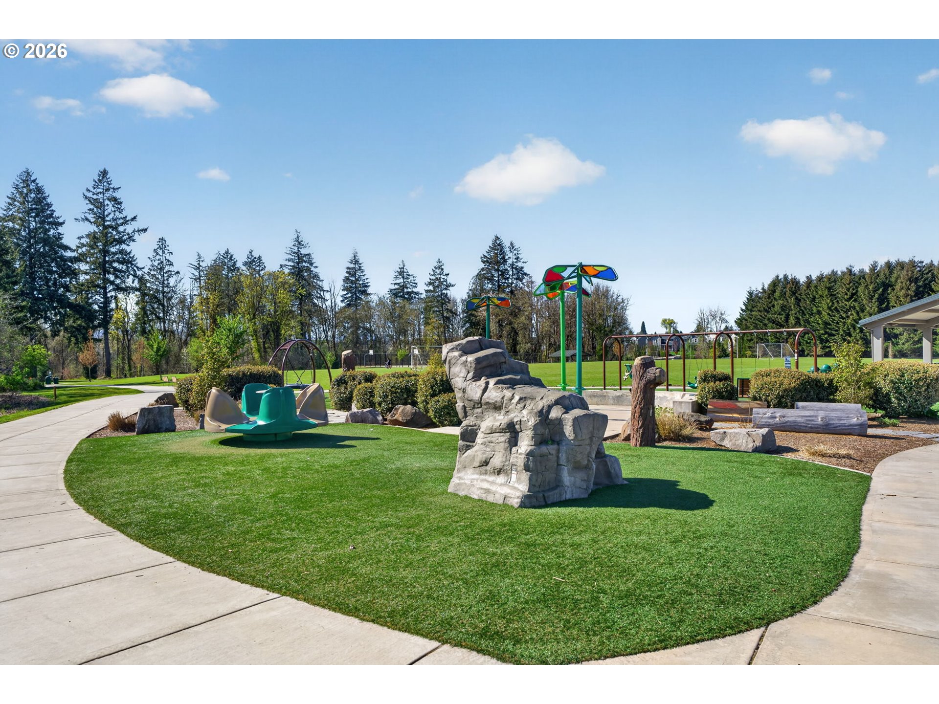 2876 South Nectarine Street Cornelius, OR 97113 - Photo 40 of 42 a view of a garden with a slide