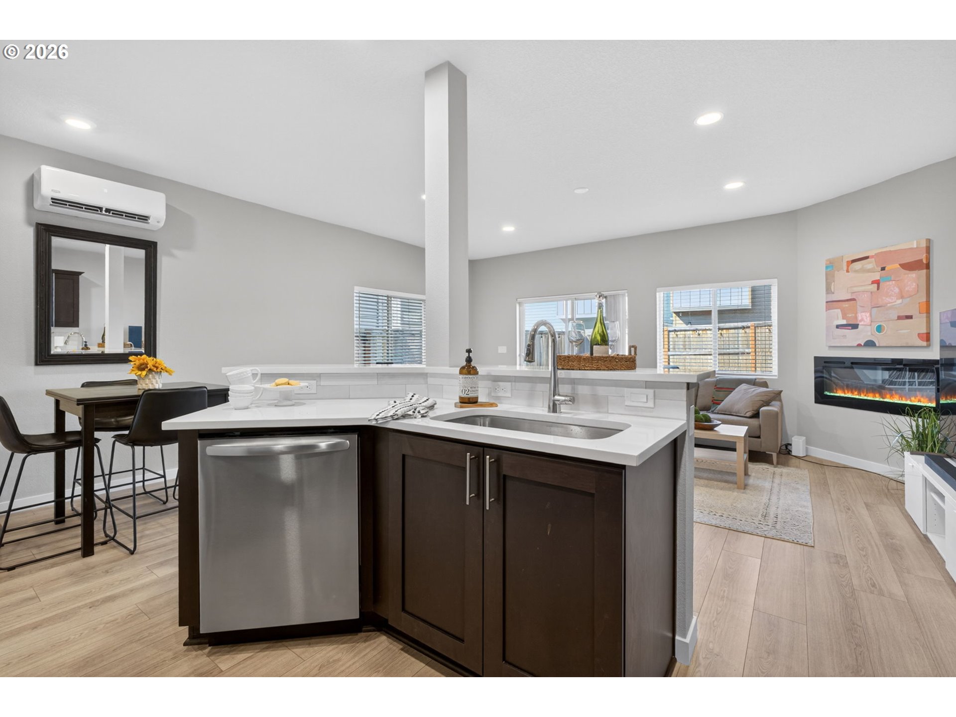 2876 South Nectarine Street Cornelius, OR 97113 - Photo 9 of 42 a kitchen with a sink cabinets and wooden floor