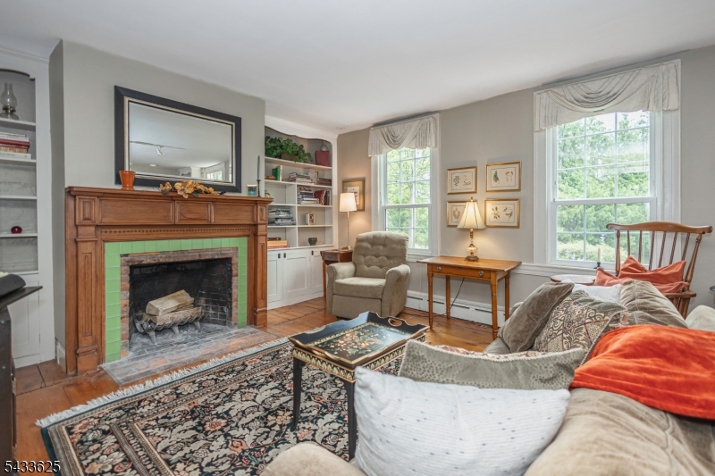 449 Stamets Road Milford, NJ 08848 - Photo 10 of 44 a living room with furniture and a fireplace