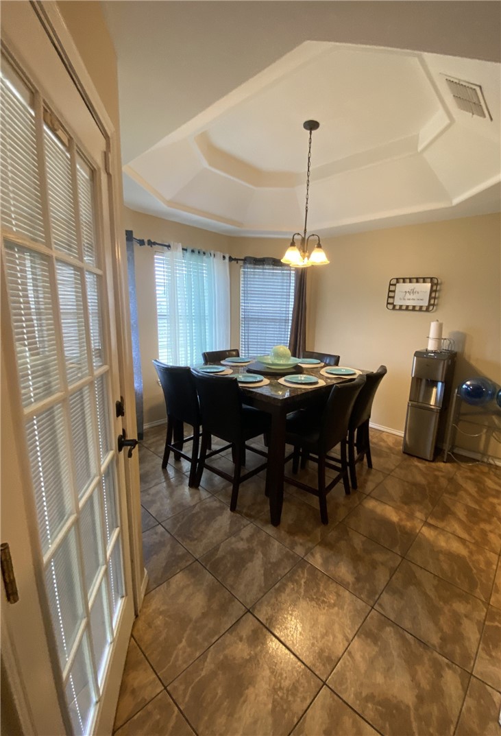 1250 Lawrence Trail Alice, TX 78332 - Photo 16 of 40 a dining room with furniture and window