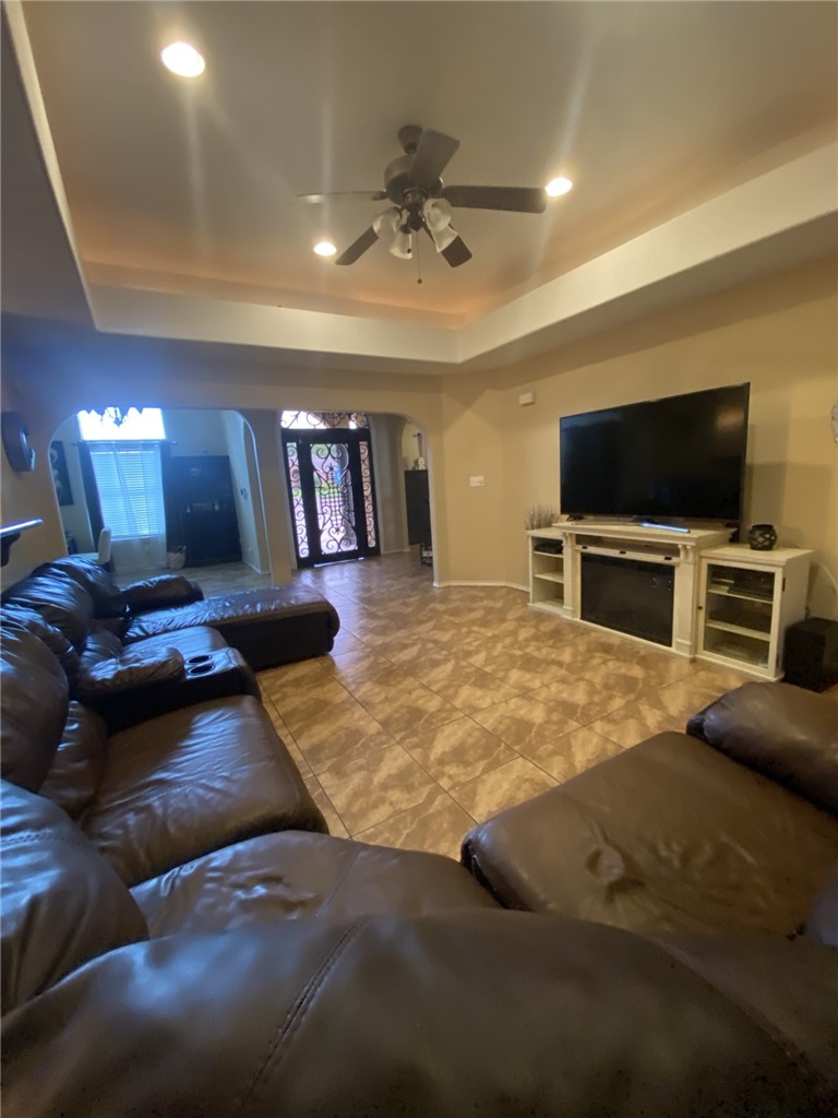 1250 Lawrence Trail Alice, TX 78332 - Photo 19 of 40 a bed room with a bed a television and a fireplace