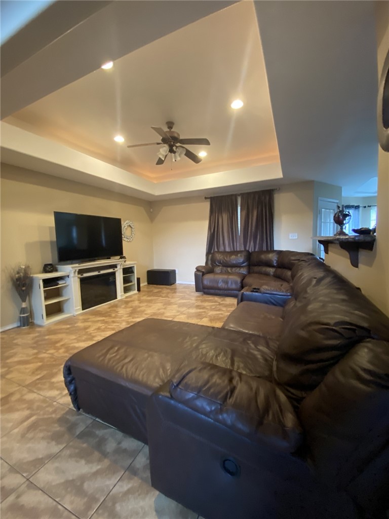1250 Lawrence Trail Alice, TX 78332 - Photo 20 of 40 a spacious bedroom with a bed and a flat screen tv