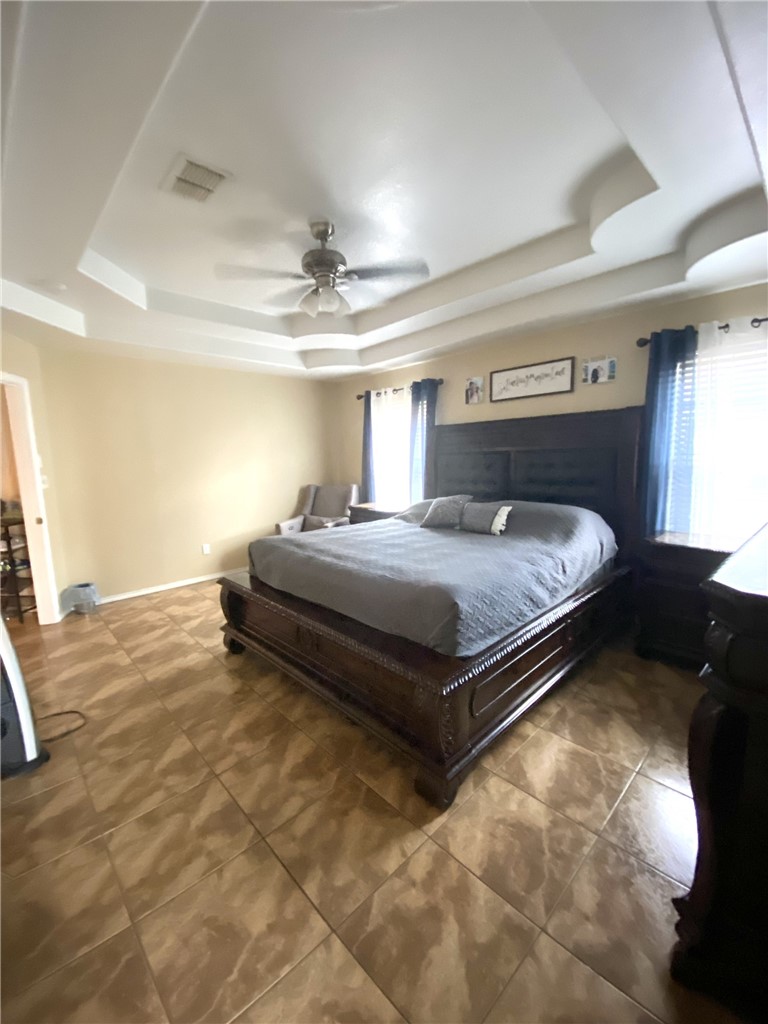 1250 Lawrence Trail Alice, TX 78332 - Photo 22 of 40 a bedroom with a bed and window