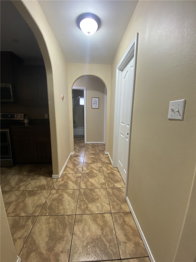 1250 Lawrence Trail Alice, TX 78332 - Photo 27 of 40 a view of a hallway with a door