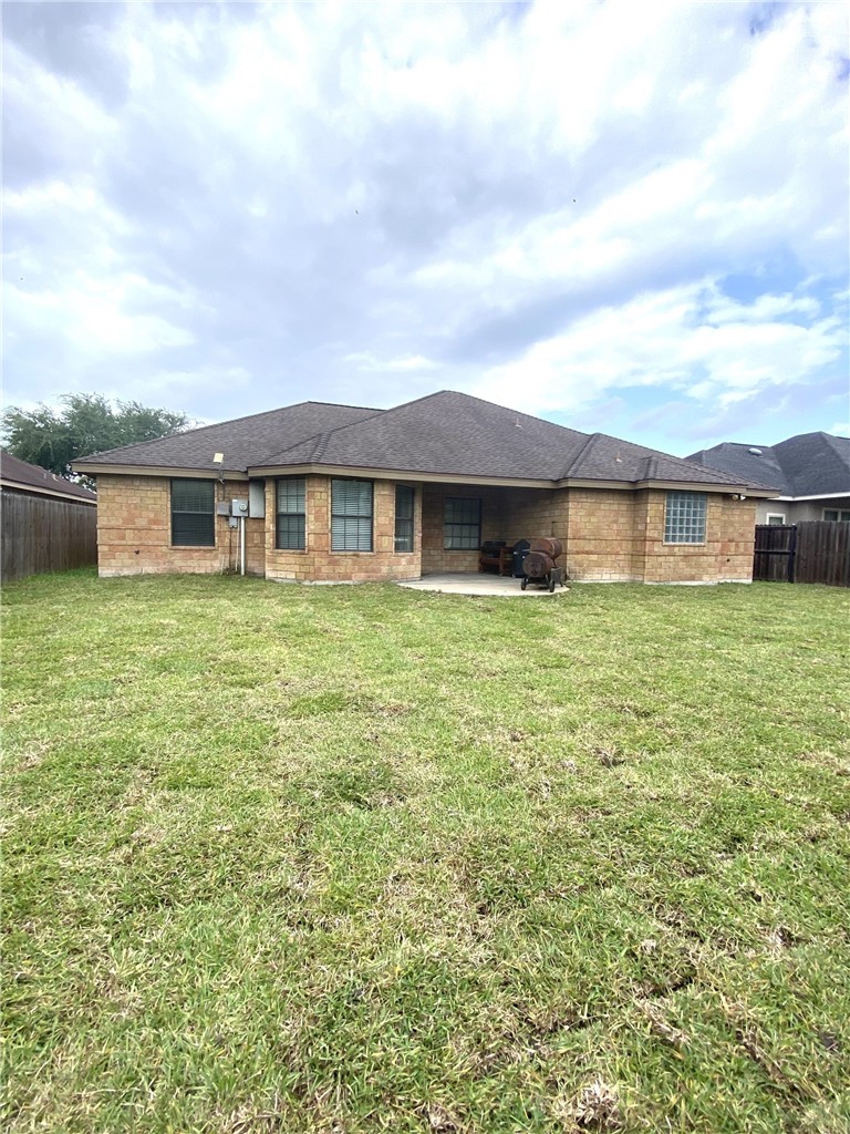 1250 Lawrence Trail Alice, TX 78332 - Photo 35 of 40 a view of a house with a big yard and large trees