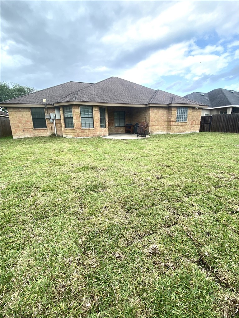 1250 Lawrence Trail Alice, TX 78332 - Photo 36 of 40 a front view of a house with a garden
