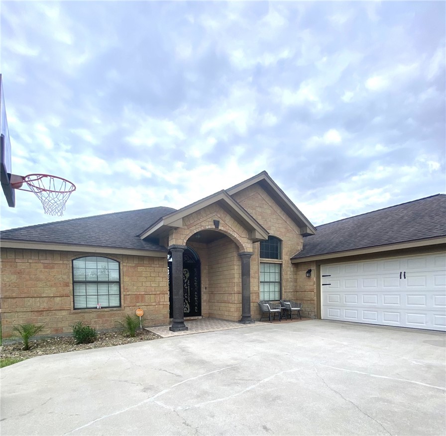 1250 Lawrence Trail Alice, TX 78332 - Photo 40 of 40 a front view of a house with a garage
