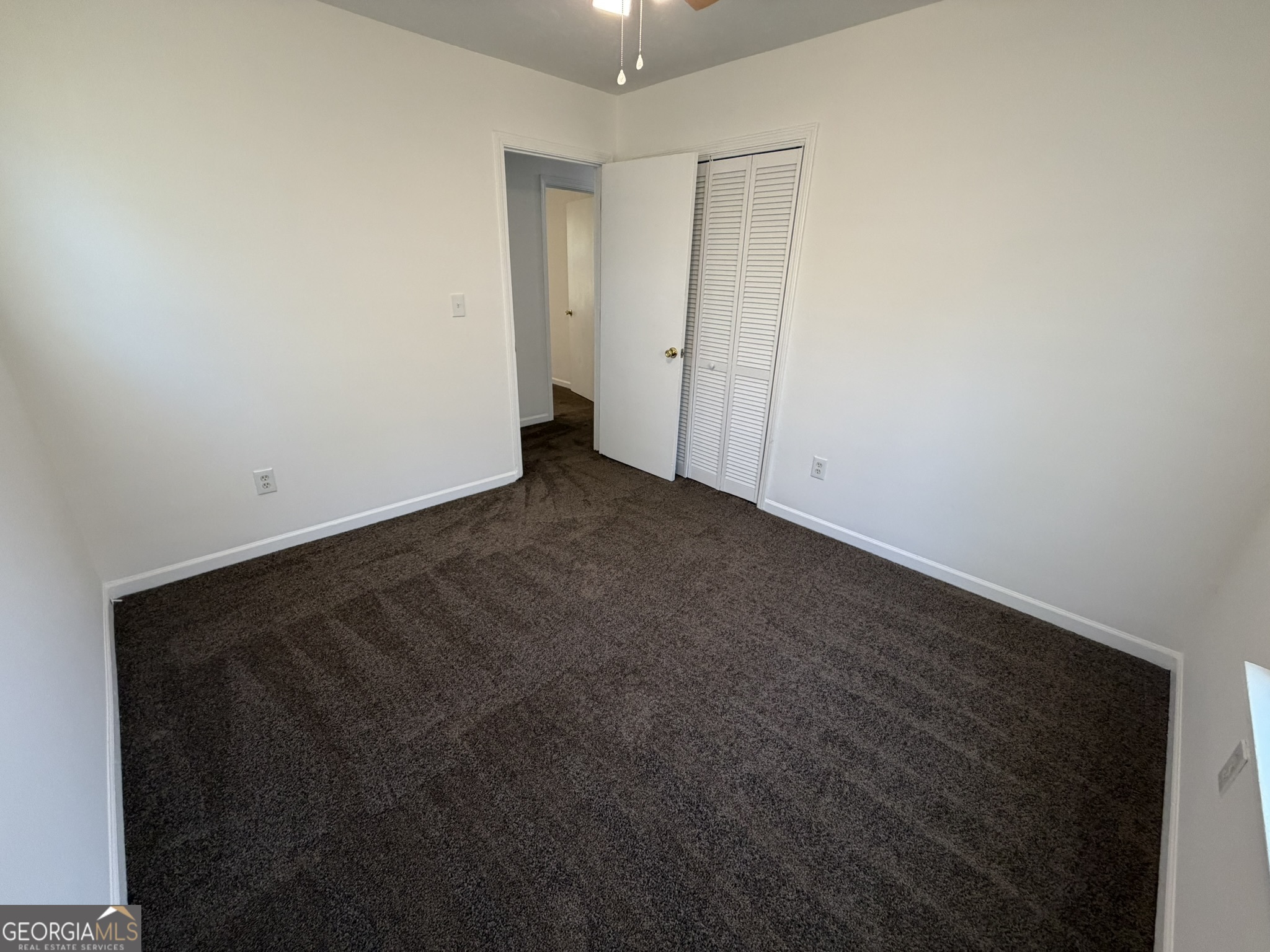 9292 Settlers Grove Road Northeast Covington, GA 30014 - Photo 41 of 110 a view of an empty room