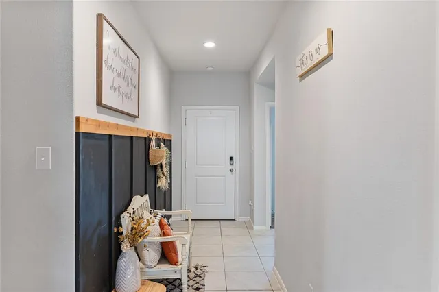 a living room with furniture flat screen tv and a fireplace